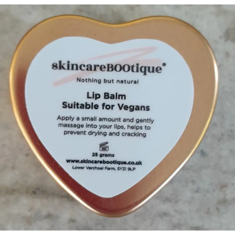 Lip Balm in a Red or a Rose Gold Tin. Natural, Unflavoured with Organic Jojoba and Organic Unrefined Shea Butter. Good for all skin types. Suitable for sensitive skin. Petroleum derivative free. Palm Oil Free. Plastic Free. Synthetic Free. 4
