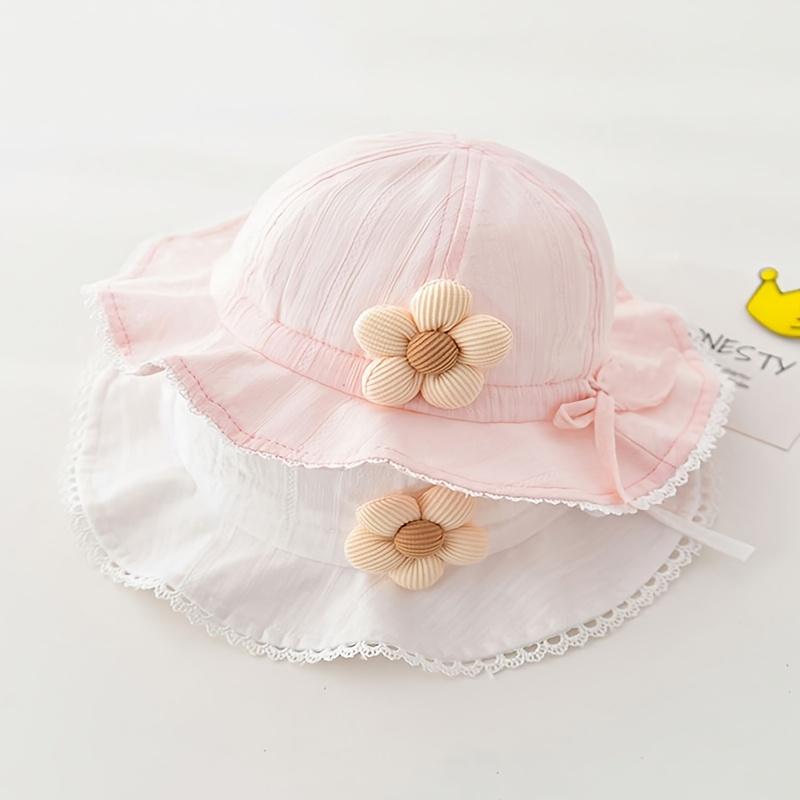 Product Introduction of Rainbow Snowman  1pc of an adorable baby straw hat that features a floral embellishment. This hat is lightweight and breathable, providing effective sun protection. Its large brim makes it ideal for outdoor activities, beach trips, and daily wear. Geared 4