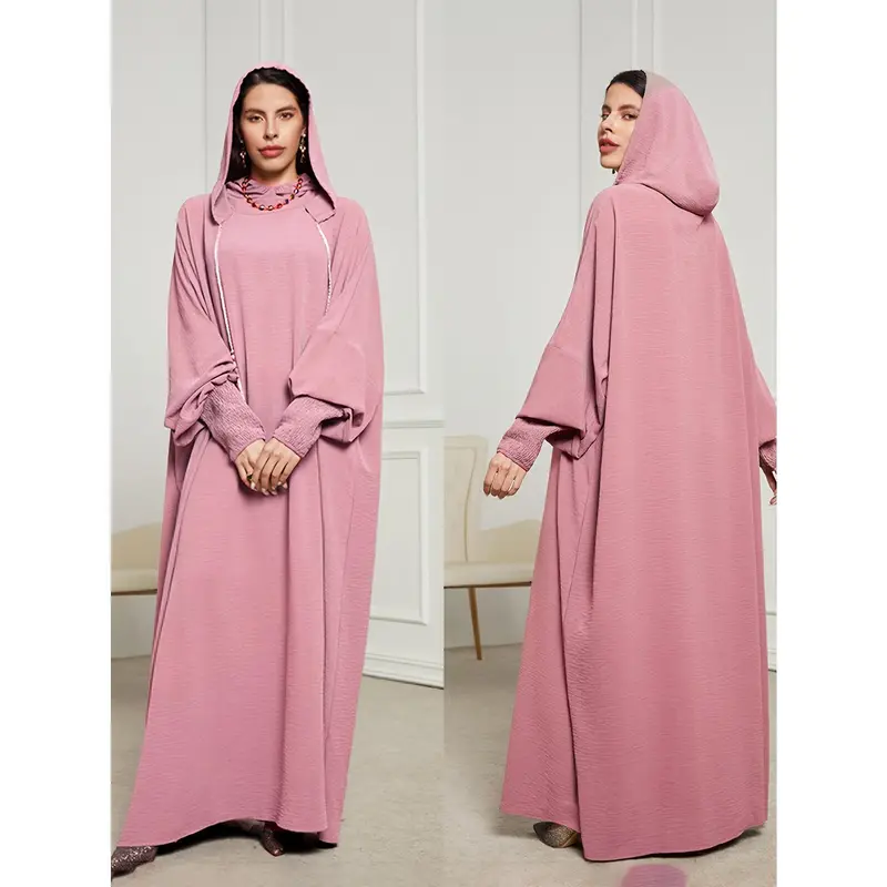 A Plain, Loose-Fitting Hooded Long Tunic for Ramadan, Featuring Elegant Batwing Sleeves, Designed for Women. 5