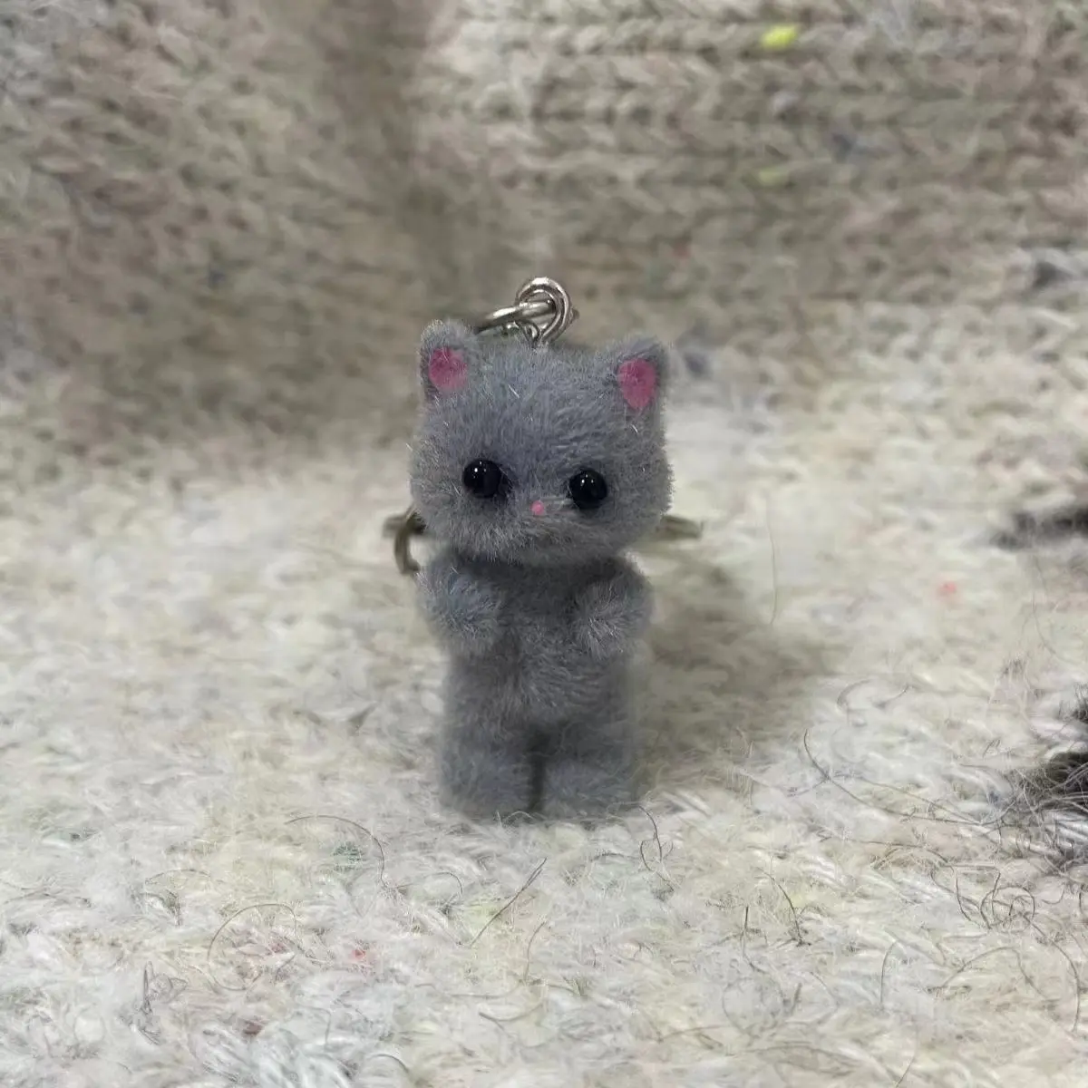 A beautiful grey kitten keychain