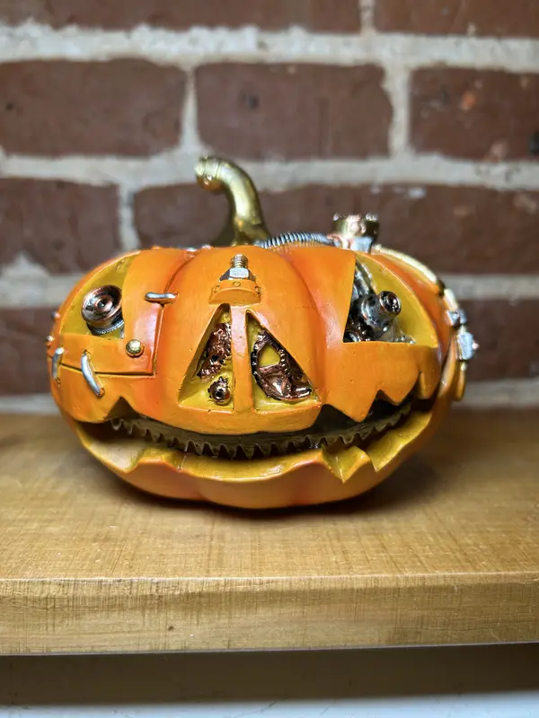 SMALL ORANGE COLOUR QUIRKY STEAM PUNK PUMPKIN ORNAMENT. RESIN. SIZE; 11CM X 13CM X 13CM APPROX 7