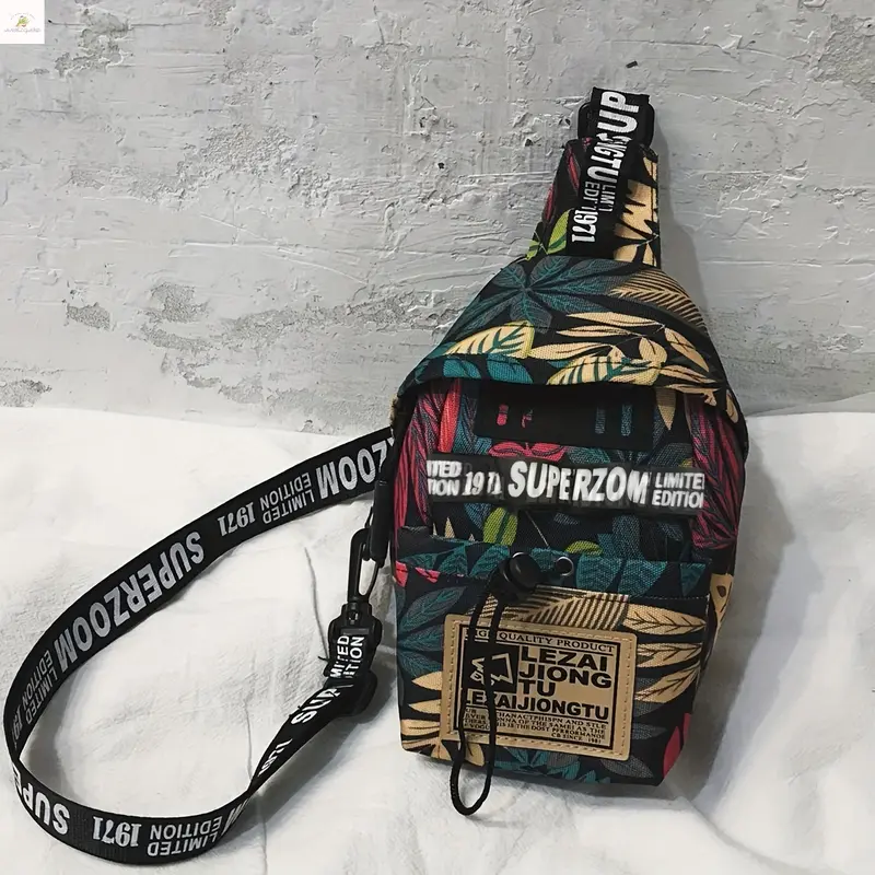 ANIELGARD  Men's Lightweight Anti-Theft Sling Bag with Tropical Leaf and Letter Print: Adjustable Crossbody Chest Pack Perfect for Travel, Work, and Sports. Great as College, School, Christmas, and Thanksgiving Gifts. 0