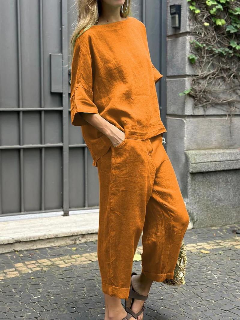 Product Introduction of Fashion Cotton Linen Women Suit Casual Half Sleeve O Neck Top And Loose Pocket Pants 2 Piece Set 2025 Spring Summer Sets Female 1