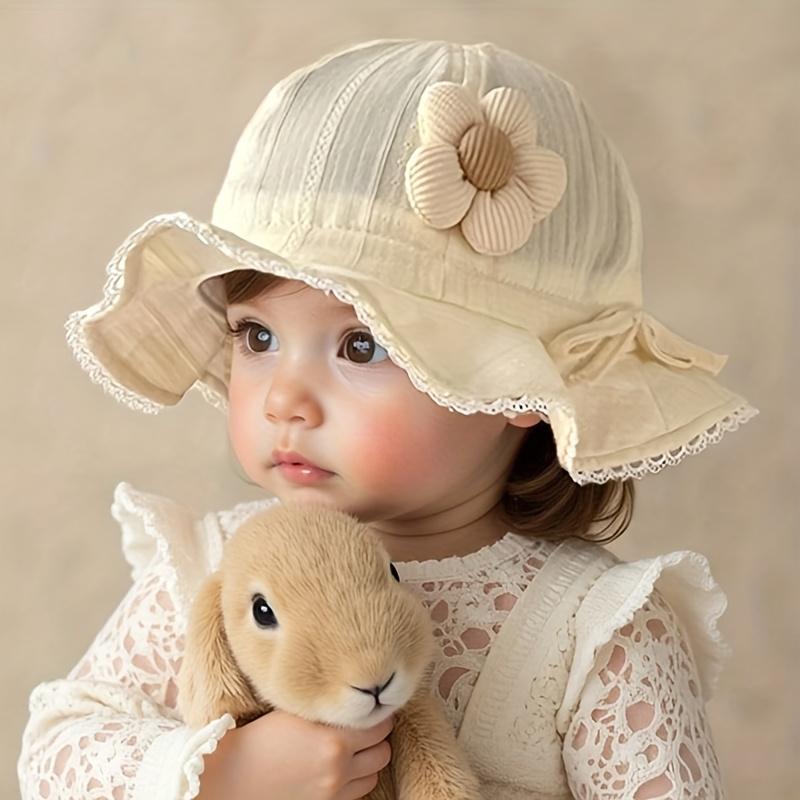Product Introduction of Rainbow Snowman  1pc of an adorable baby straw hat that features a floral embellishment. This hat is lightweight and breathable, providing effective sun protection. Its large brim makes it ideal for outdoor activities, beach trips, and daily wear. Geared 0