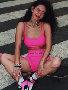 Hawaiian sexy girl with bright colored waistband shorts for swimsuit