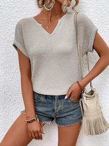 Women's solid color V-neck short sleeved T-shirt, textured and lazy style short top, paired with fringed denim shorts to create a relaxed and casual style