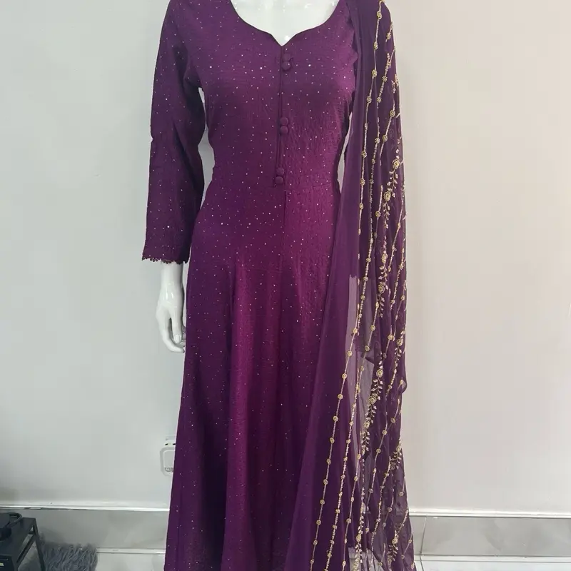 Noor long maxi dress on linen material with a heavy embroidered chiffon duppata plum colour