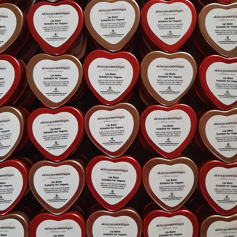 Lip Balm in a Red or a Rose Gold Tin. Natural, Unflavoured with Organic Jojoba and Organic Unrefined Shea Butter. Good for all skin types. Suitable for sensitive skin. Petroleum derivative free. Palm Oil Free. Plastic Free. Synthetic Free. 2