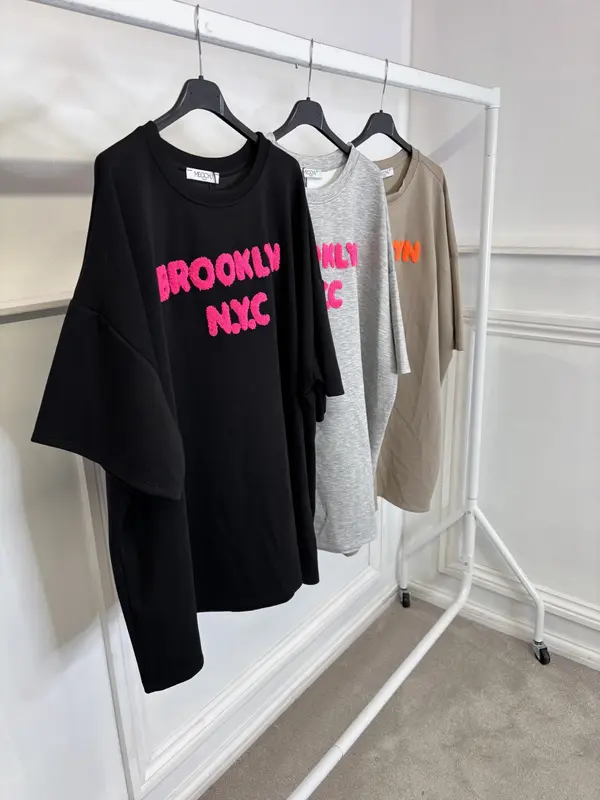 KMO flocked logo oversized t-shirt with half sleeves 1