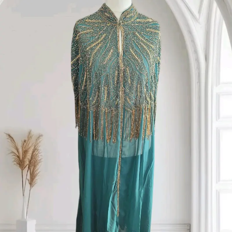 Step into elegance with our hand-embroidered kaftan! Each stitch is a masterpiece, blending tradition with modern flair. Perfect for any occasion, this luxurious piece adds effortless style to your wardrobe.  #HandEmbroidered #KaftanStyle #FashionGoa 1