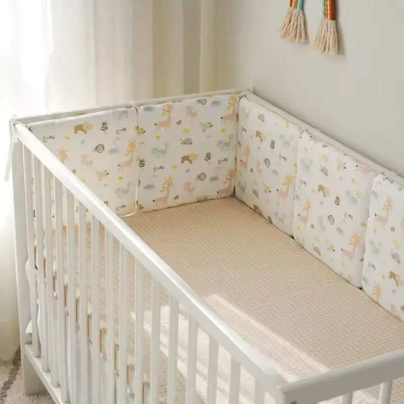 Beige animal print baby cot bumper 1