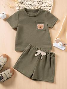 Baby's 2pcs Cartoon Bear Patched Textured Short Sleeve T-Shirt & Bow Decor Shorts Set, National Day Offers, Cute Pocket Round Neck Tee & Elastic Waist Shorts, Casual Summer Outfits Clothes for Infant Toddler Boys