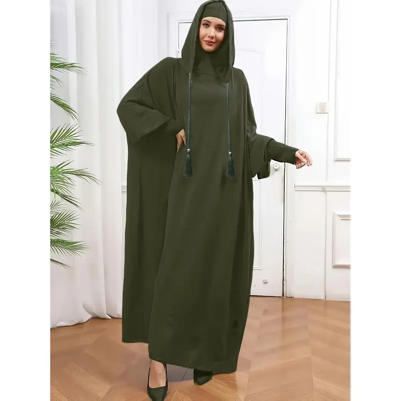 A Plain, Loose-Fitting Hooded Long Tunic for Ramadan, Featuring Elegant Batwing Sleeves, Designed for Women. 2