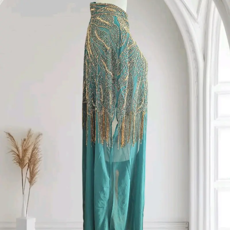 Step into elegance with our hand-embroidered kaftan! Each stitch is a masterpiece, blending tradition with modern flair. Perfect for any occasion, this luxurious piece adds effortless style to your wardrobe.  #HandEmbroidered #KaftanStyle #FashionGoa 2