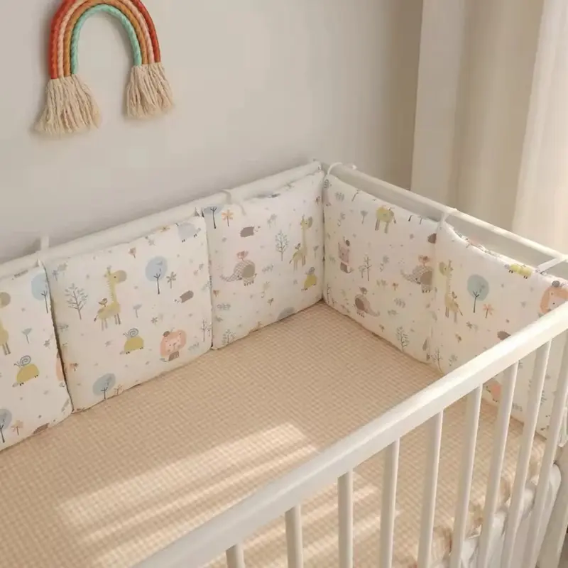 Beige animal print baby cot bumper 0