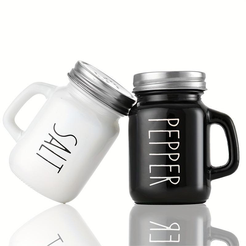 Product Introduction of 2pcs Farmhouse Salt And Pepper Shaker Set, Vintage Glass Black And White Shaker, 4.4OZ Spice Shakers With Handle And Stainless Steel Lid, Spice Jar, Pepper Jar, Salt Jar, Kitchen Accessaries, Back To School Supplies, Chrismas Gifts, Halloween Gifts 1
