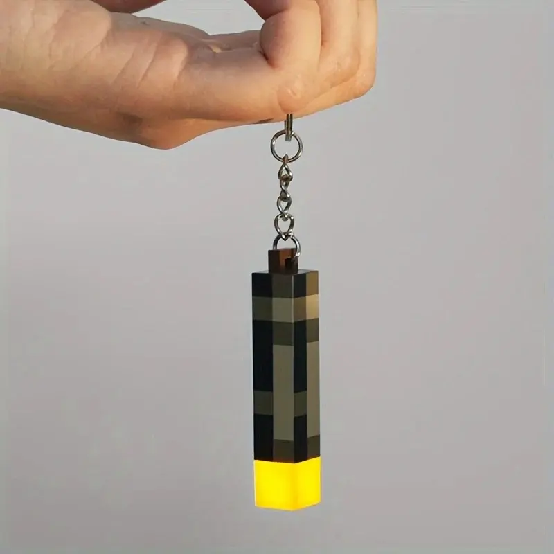 Glow-in-the-Dark Anime Gamer Keychain - Classic Torch Design with Pixelated Wooden Texture, Fashionable Plastic Pendant 0