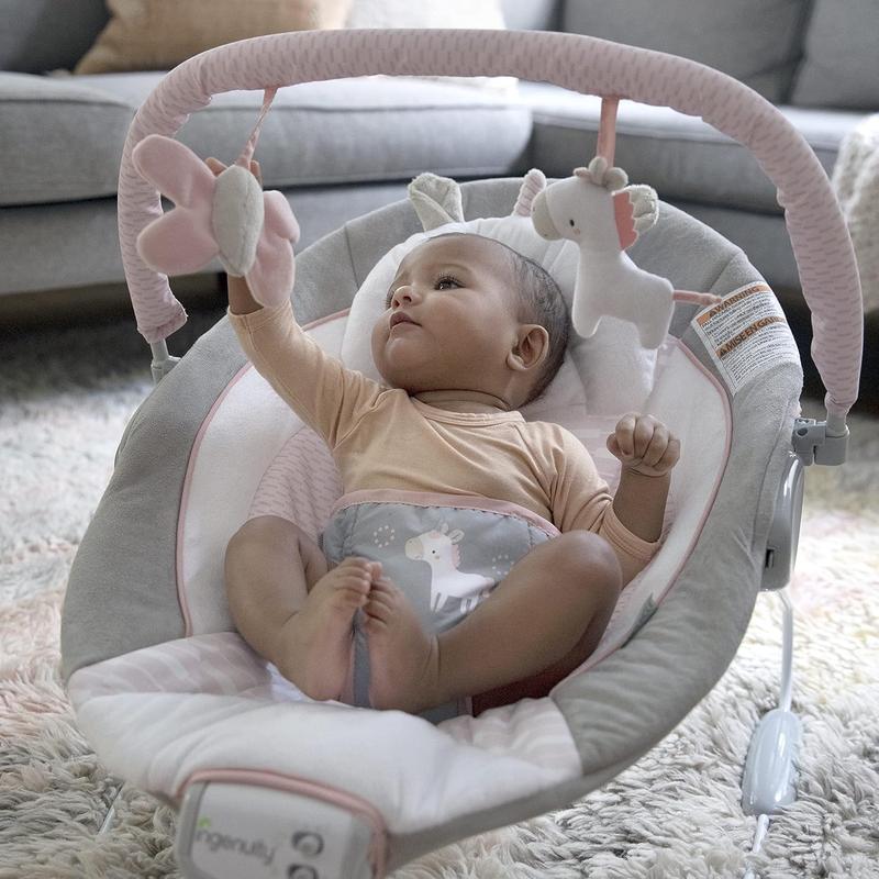 Ingenuity, Cradling Baby Bouncer Seat Flora the Unicorn, Ultra-Plush Padded Chair with Vibration and Melodies, Removable Toy Bar, Ages Newborn 1