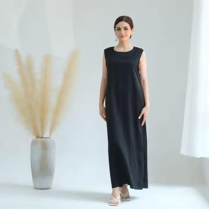 The Hadiqa Abaya - a black satiny 'Dubai' Abaya with black and hand sewn silver bead work in a flower pattern pattern and includes a chiffon hijab. 8