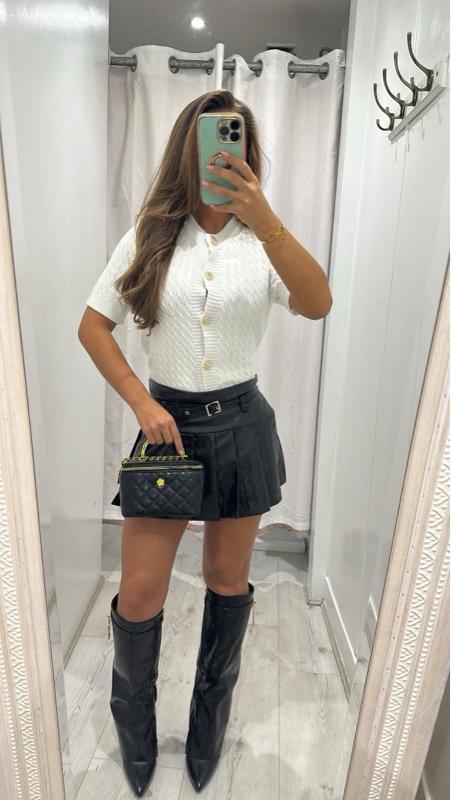 Black faux leather pleated mini skort, stylish ANNA everyday wear.