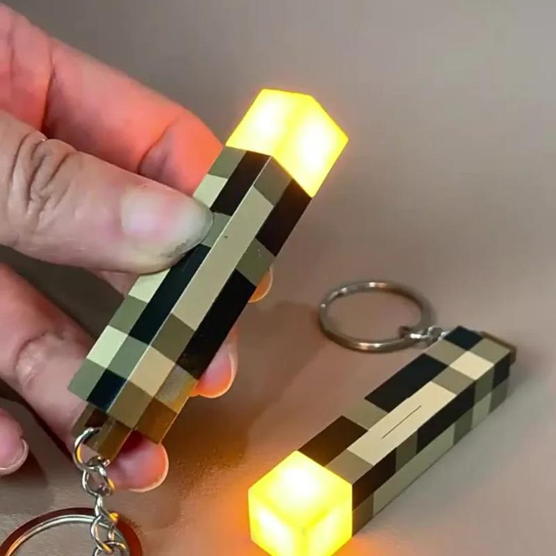 Glow-in-the-Dark Anime Gamer Keychain - Classic Torch Design with Pixelated Wooden Texture, Fashionable Plastic Pendant 1